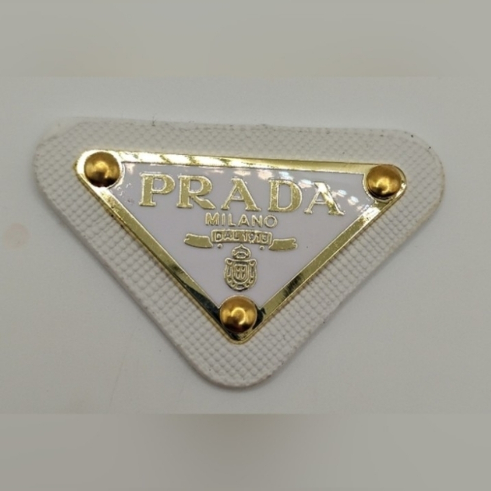 Prada White And Gold Triangular Logo Patch - image 1
